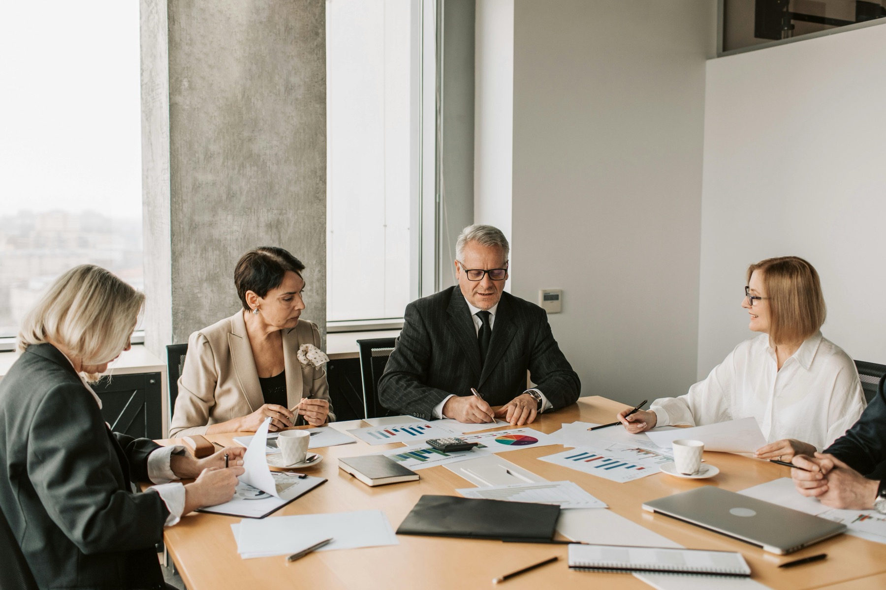 Operators discussing work in a meeting