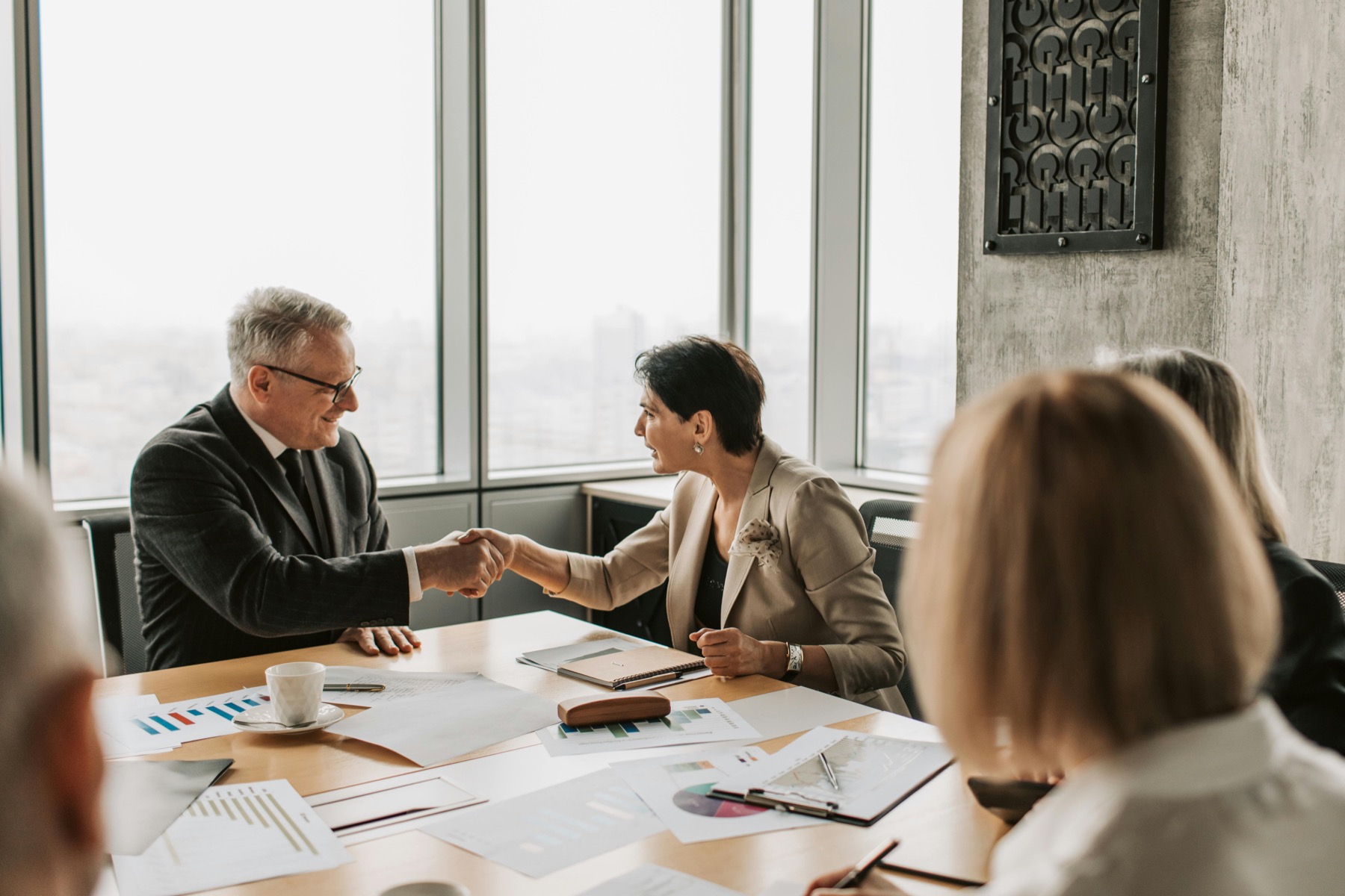 Client meeting with a handshake